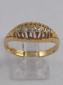 Appraisal: A hallmarked carat gold diamond five stone ring Birmingham