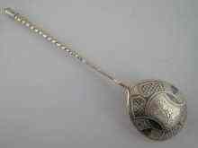 Appraisal: A Russian hallmarked silver spoon with niello decoration Moscow approx