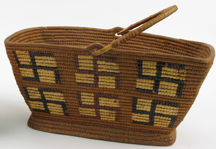 Appraisal: A COAST SALISHAN INDIAN COILED AND HANDLED GATHERING BASKET having