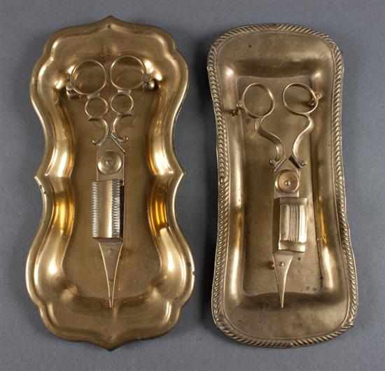 Appraisal: Two early Victorian brass candle snips and undertrays mid- th