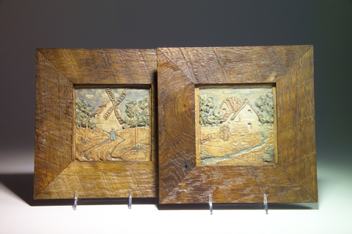 Appraisal: MURESQUE Pair of tiles one modeled with a windmill in