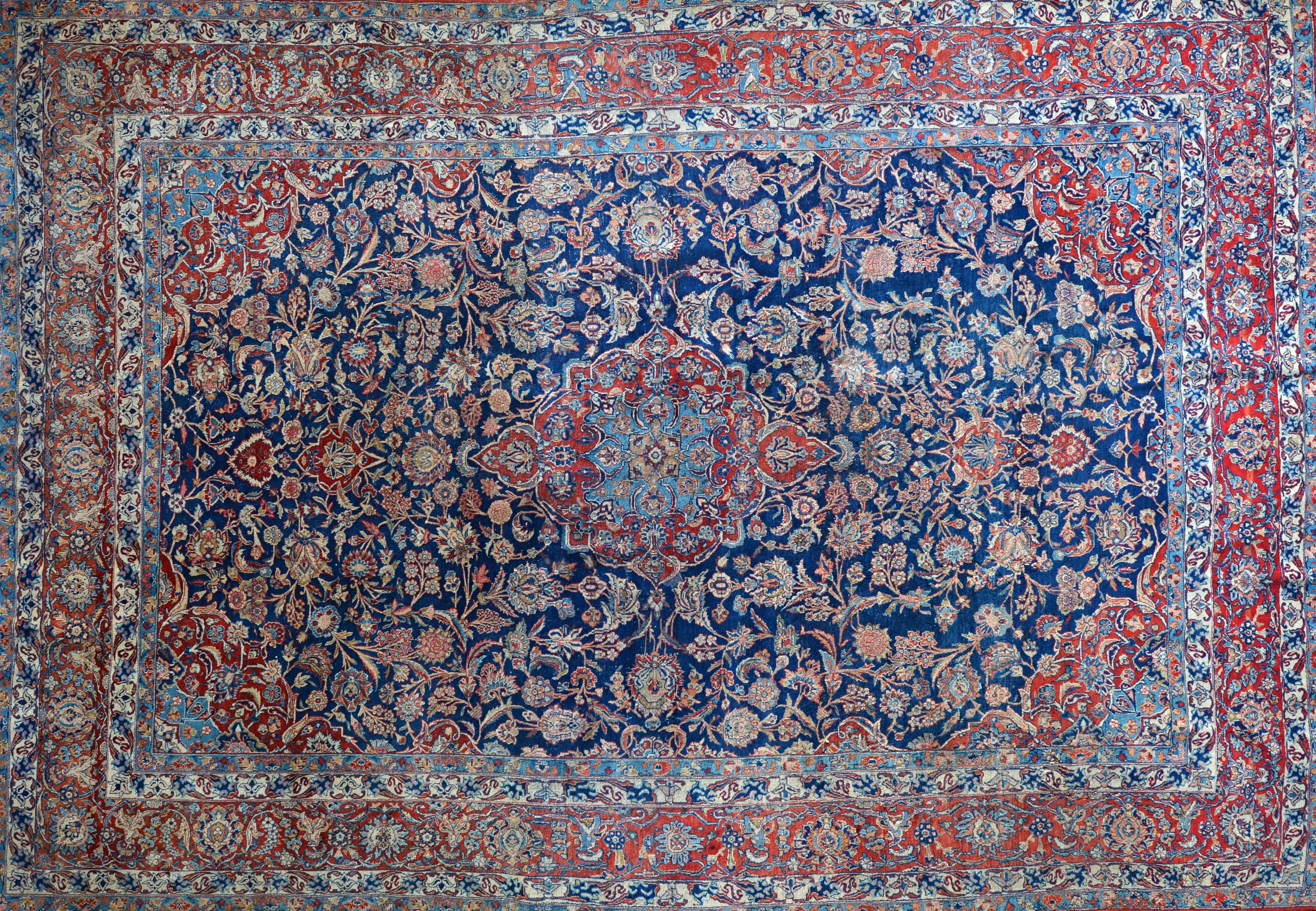 Appraisal: A Kashan carpet early th century with blue field and