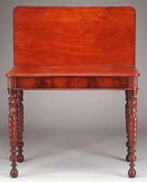 Appraisal: CARVED MAHOGANY SHERATON CARD TABLE The rounded square top having