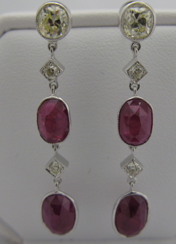 Appraisal: PAIR OF RUBY DIAMOND AND EIGHTEEN KARAT WHITE GOLD EARRINGS