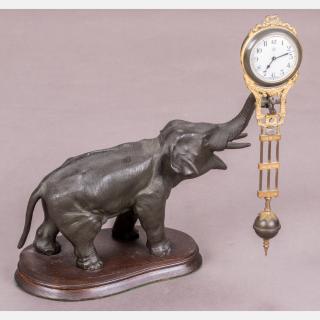 Appraisal: A Junghans Elephant Swinger Clock th Century In working order