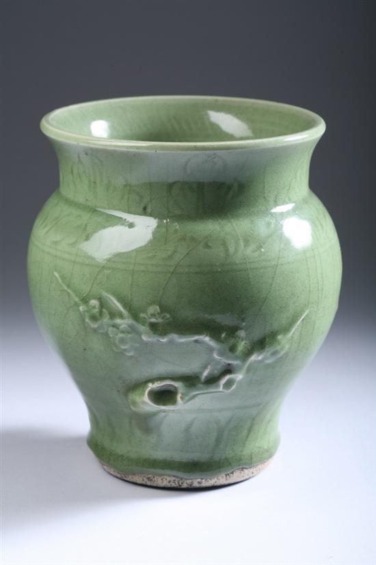 Appraisal: CHINESE CELADON PORCELAIN VASE Yuan Dynasty-style With molded flowering prunus