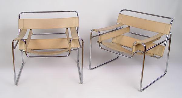 Appraisal: PAIR WASSILY CHAIRS DESIGN BY MARCEL BREUER Tan leather seat