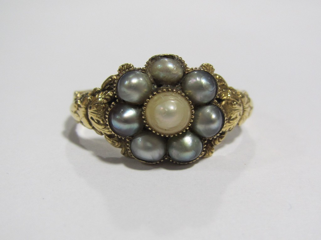 Appraisal: A Victorian gold remembrance ring with black and white pearl