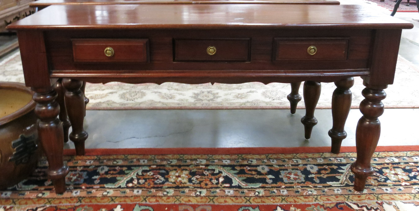 Appraisal: MAHOGANY COLONIAL REVIVAL SOFA TABLE the long rectangular top over