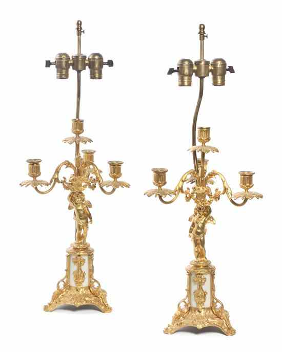 Appraisal: A Pair of Gilt Bronze and Marble Four-Light Candelabra having