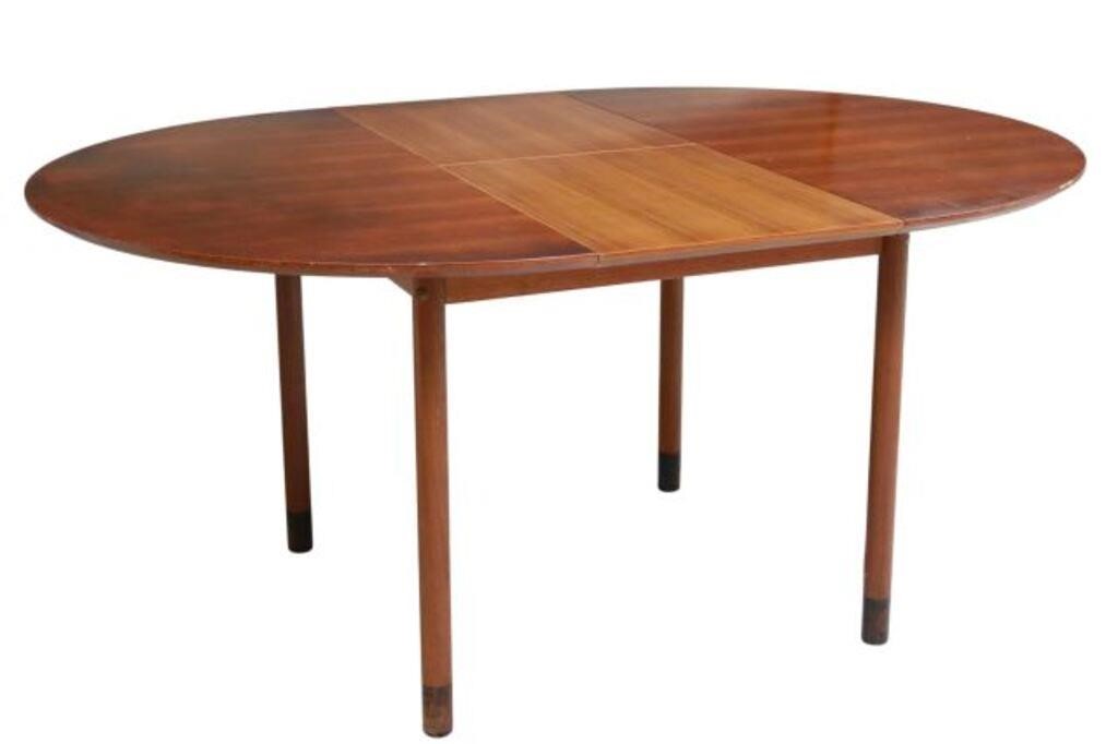 Appraisal: Italian mid-century modern extension table c s round top extends