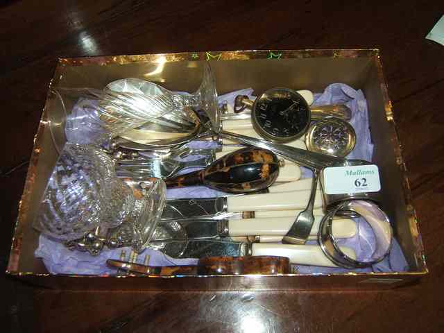 Appraisal: TWO SILVER NAPKIN RINGS together with a small quantity of