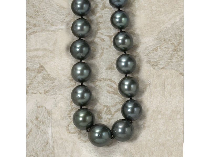 Appraisal: BLACK SOUTH SEA PEARLS With diamond ball clasp Graduated in