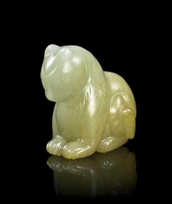 Appraisal: A Carved Jade Toggle of a Tiger of a celadon