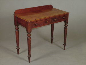 Appraisal: A Victorian mahogany two drawer side table the moulded top