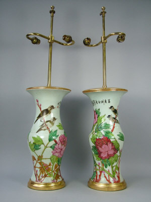 Appraisal: A pair of oriental pottery lamp bases with gilt brass