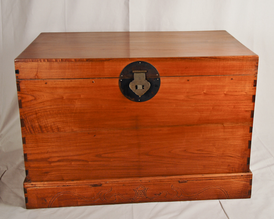 Appraisal: An Asian Captains Chest with dovetailed construction and natural wood