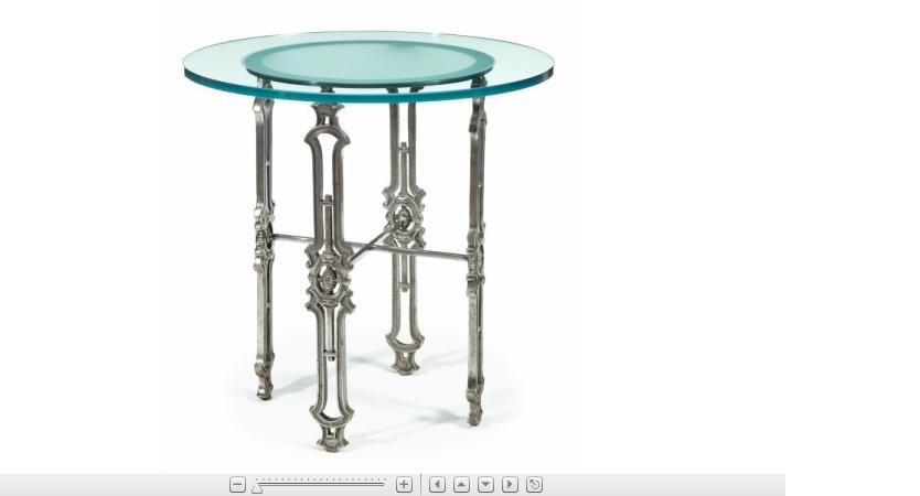 Appraisal: French glass and stainless steel occasional tableCircular glass top over