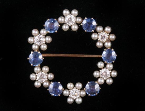 Appraisal: K YELLOW GOLD DIAMOND SAPPHIRE AND SEED PEARL CIRCLE PIN