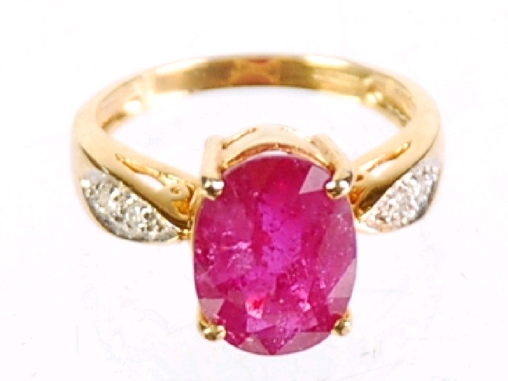 Appraisal: ct GOLD 'RUBY' AND DIAMOND RING set with a large