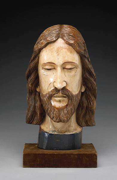 Appraisal: A Spanish style polychrome carved wood head of Christ th