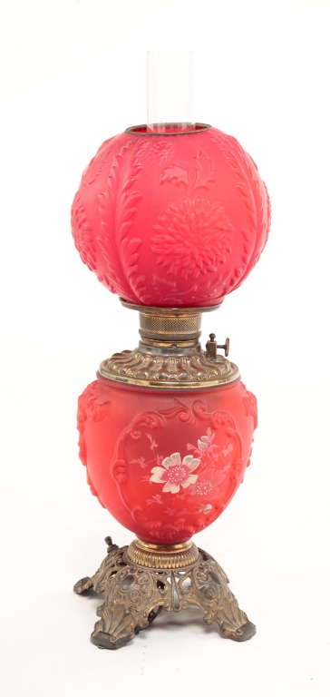 Appraisal: American th century Red satin glass globes with clear hurricane