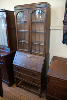 Appraisal: OAK BUREAU TWO DOOR GLAZED BOOKCASE