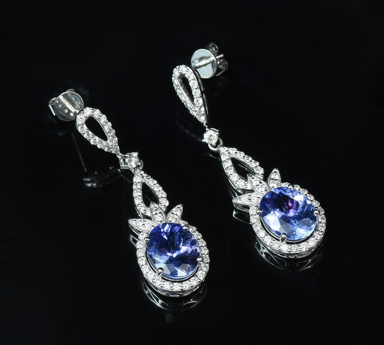 Appraisal: PLATINUM CTW TANZANITE DIAMOND EARRINGS oval cut CTW tanzanites dazzle