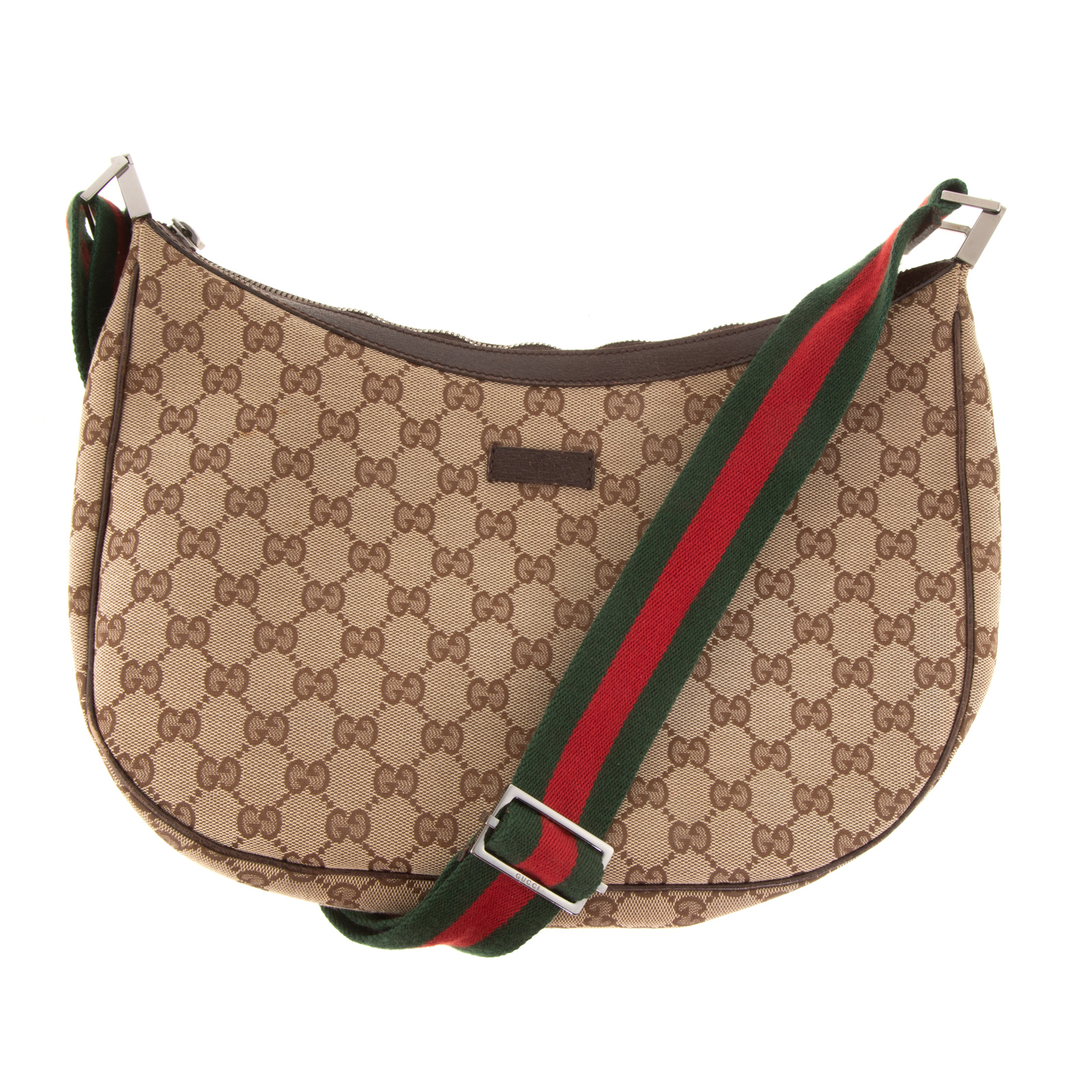 Appraisal: A GUCCI ZIP MESSENGER A brown and tan Monogram canvas