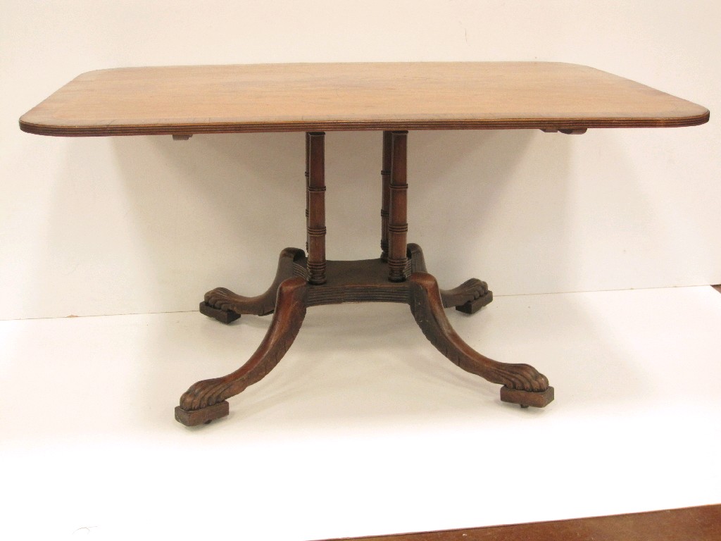 Appraisal: A Georgian mahogany Breakfast Table with reeded rectangular cross-banded top