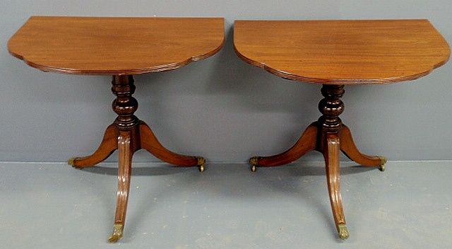 Appraisal: Two-part George III style mahogany breakfast table with reeded down-swept