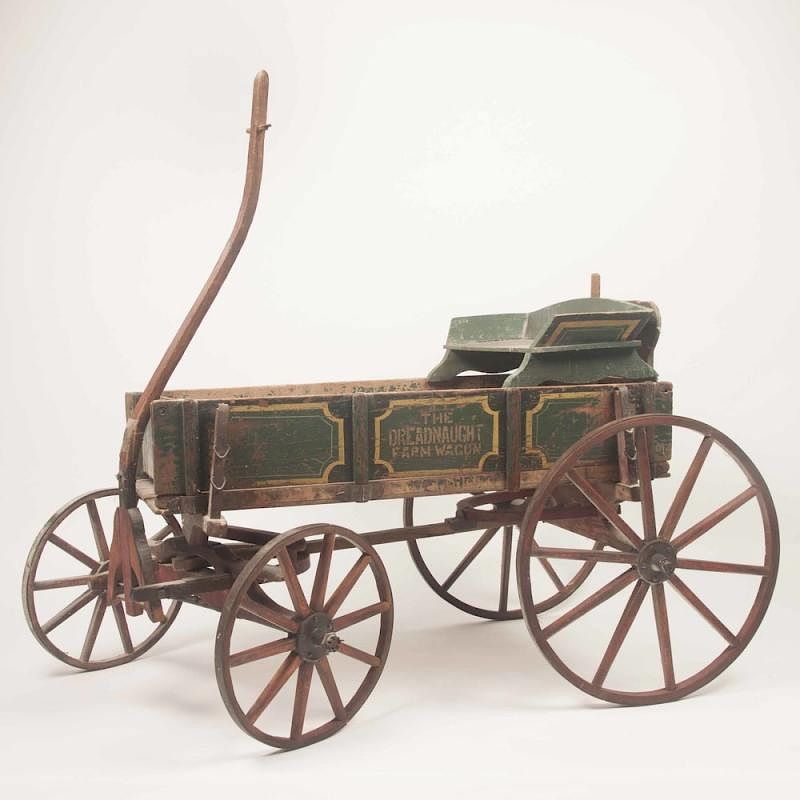 Appraisal: Painted Wood Wagon Painted wood wagon Dimensions h x l