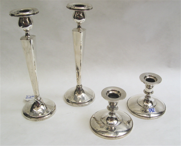 Appraisal: TWO PAIR AMERICAN STERLING SILVER CANDLESTICKS pieces the taller pair