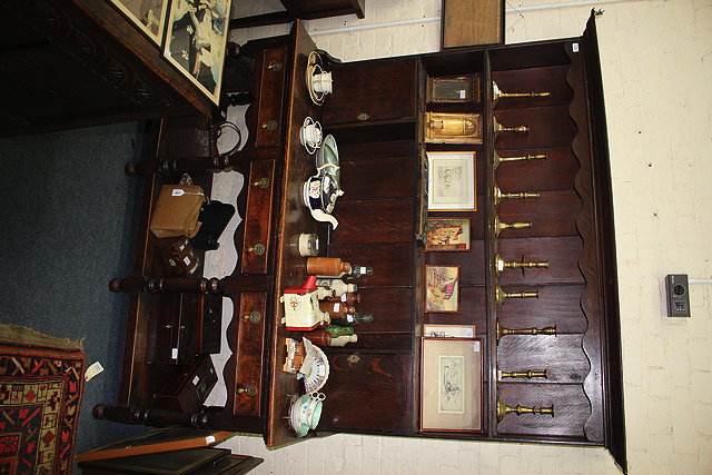 Appraisal: AN OLD OAK DRESSER the plate rack above with twin