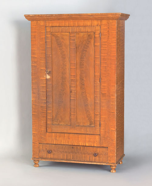 Appraisal: Pennsylvania painted wardrobe mid th c retaining its original ochre