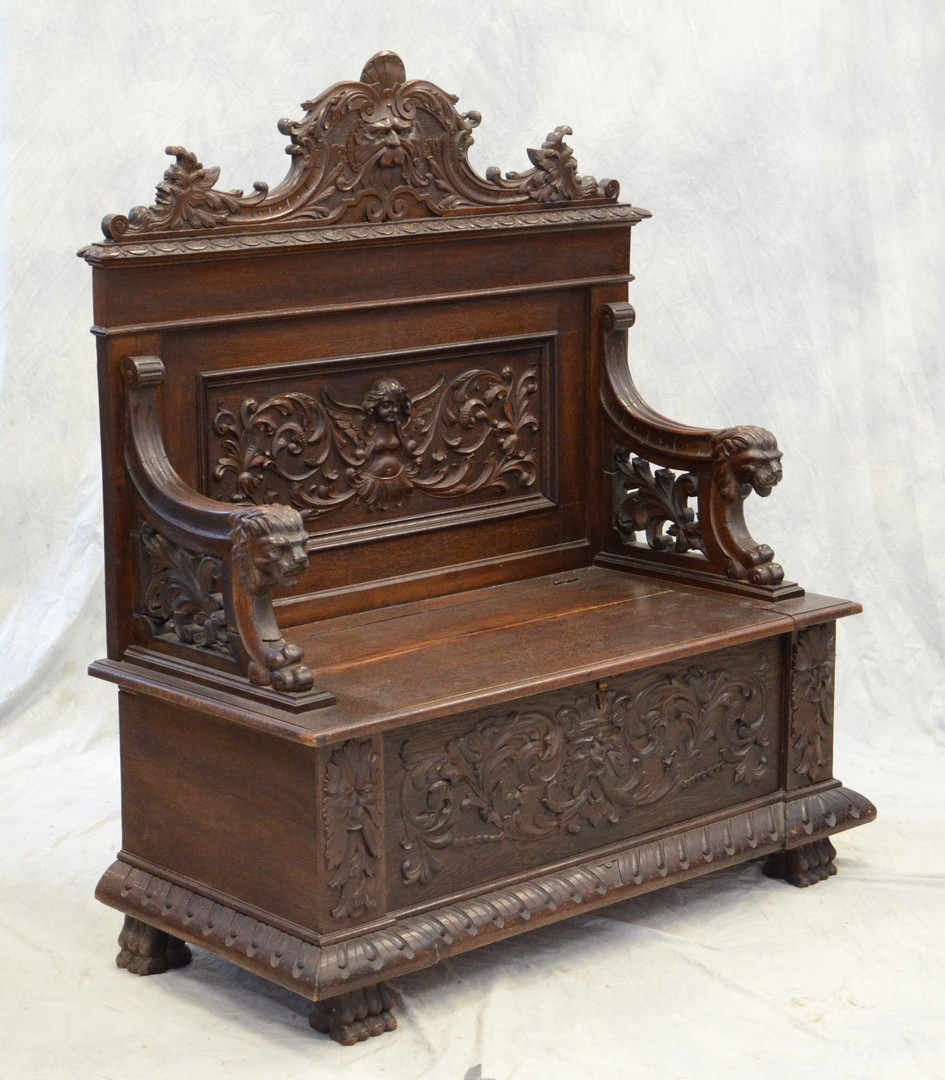 Appraisal: Carved oak English hall bench north wind faces in crest