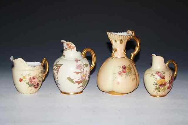 Appraisal: A GROUP OF FOUR ROYAL WORCESTER BLUSH IVORY JUGS each