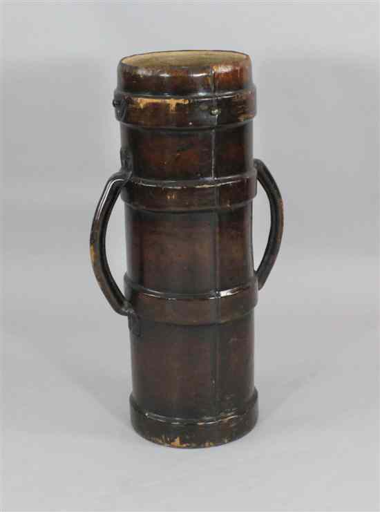 Appraisal: An early th century brown leather shell carrier stick stand