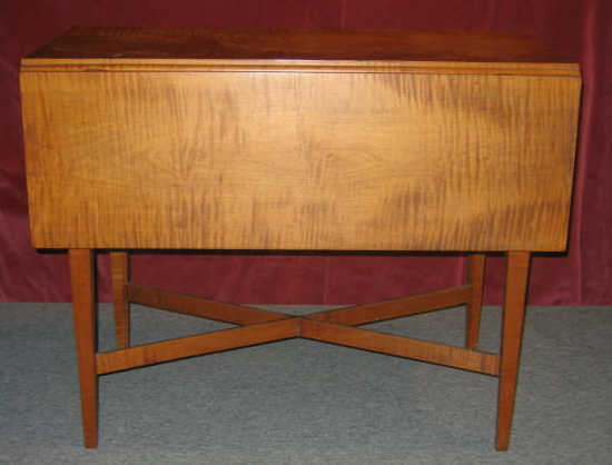 Appraisal: AMERICAN FEDERAL TIGER MAPLE DROP LEAF TABLE Rectangular top with