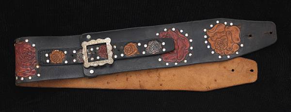 Appraisal: A Jerry Garcia tooled leather guitar strap by Nudie's worn