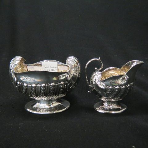 Appraisal: English Sterling Silver Sugar Creamer helmet form hallmarks of Sheffield