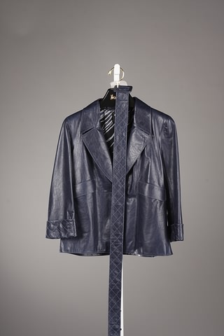 Appraisal: Chanel deep blue leather jacket with quilted belt and quilted