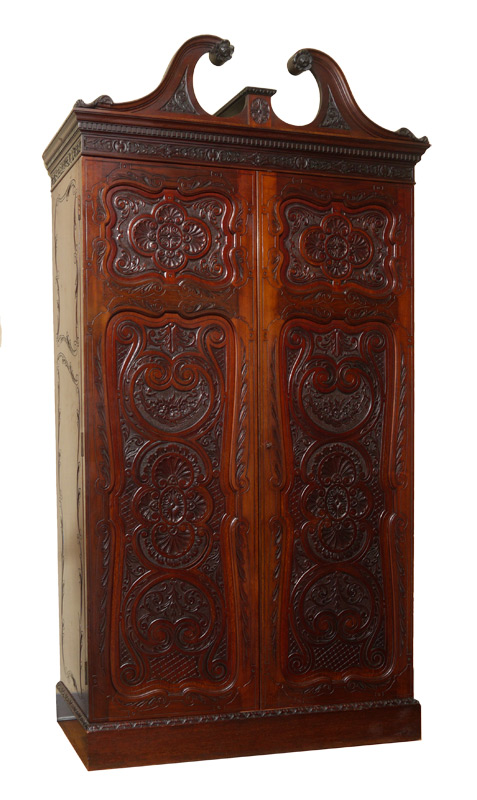 Appraisal: RICHLY CARVED VICTORIAN ARMOIRE Broken arch swan neck pediment with