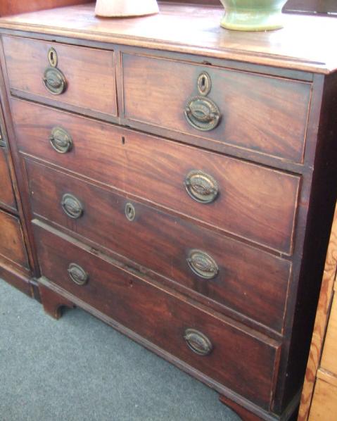 Appraisal: A George III mahogany chest of two short and three