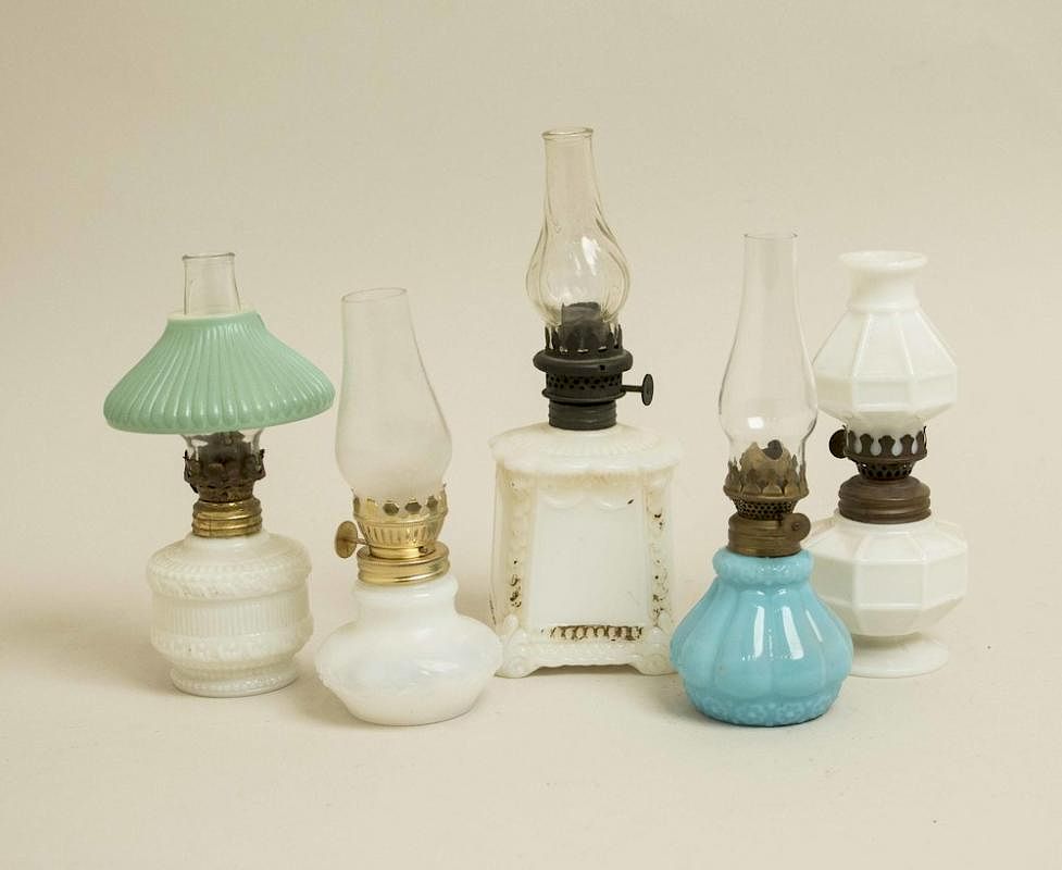 Appraisal: Five Assorted Small Oil Lamps Five assorted small white and