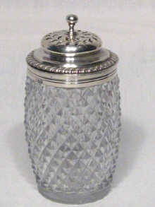 Appraisal: A silver mounted cut glass caster with gadrooned rim maker's