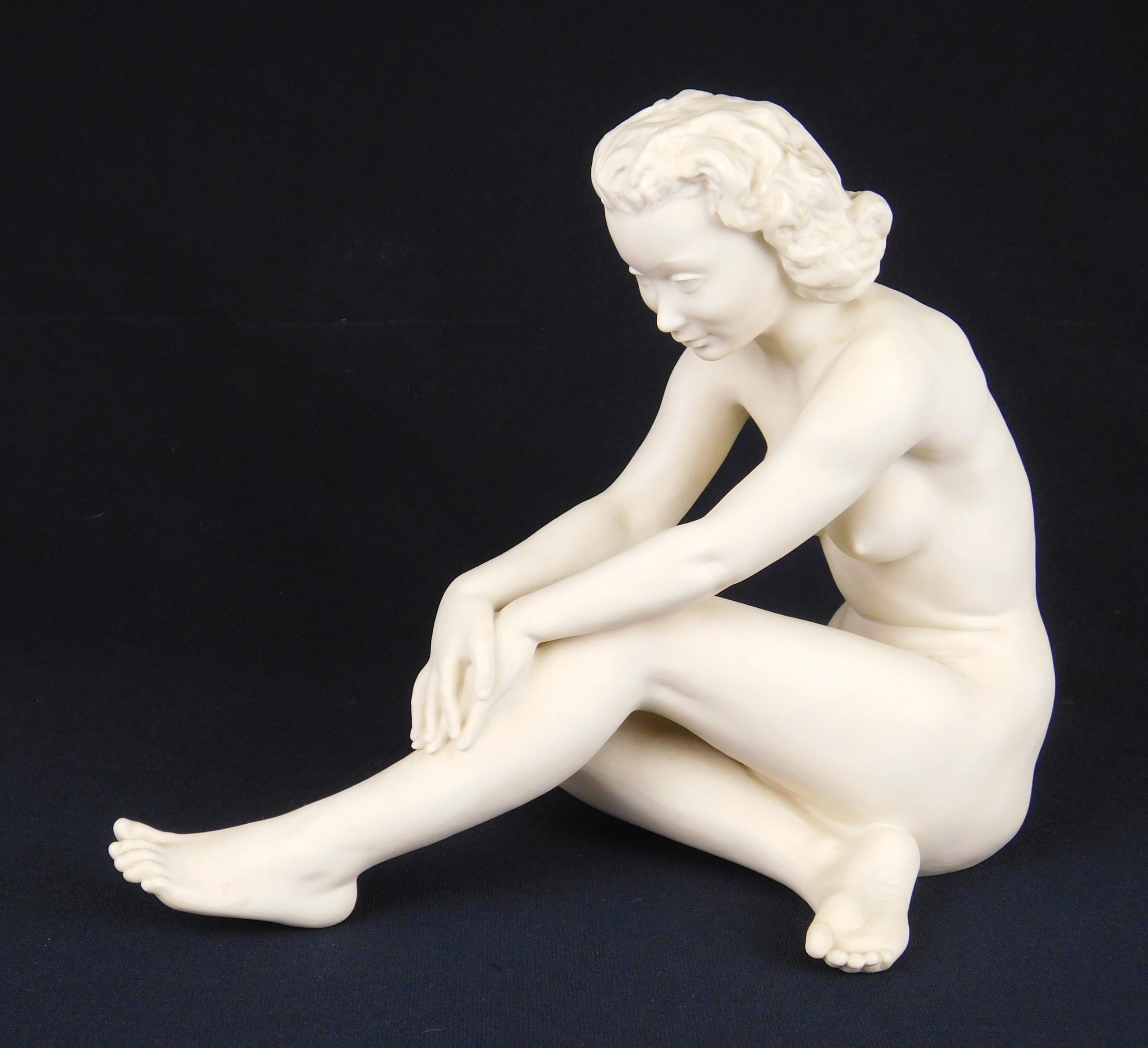 Appraisal: Hutschenreuther bisque porcelain figurine Seated Nude marked on bottom also