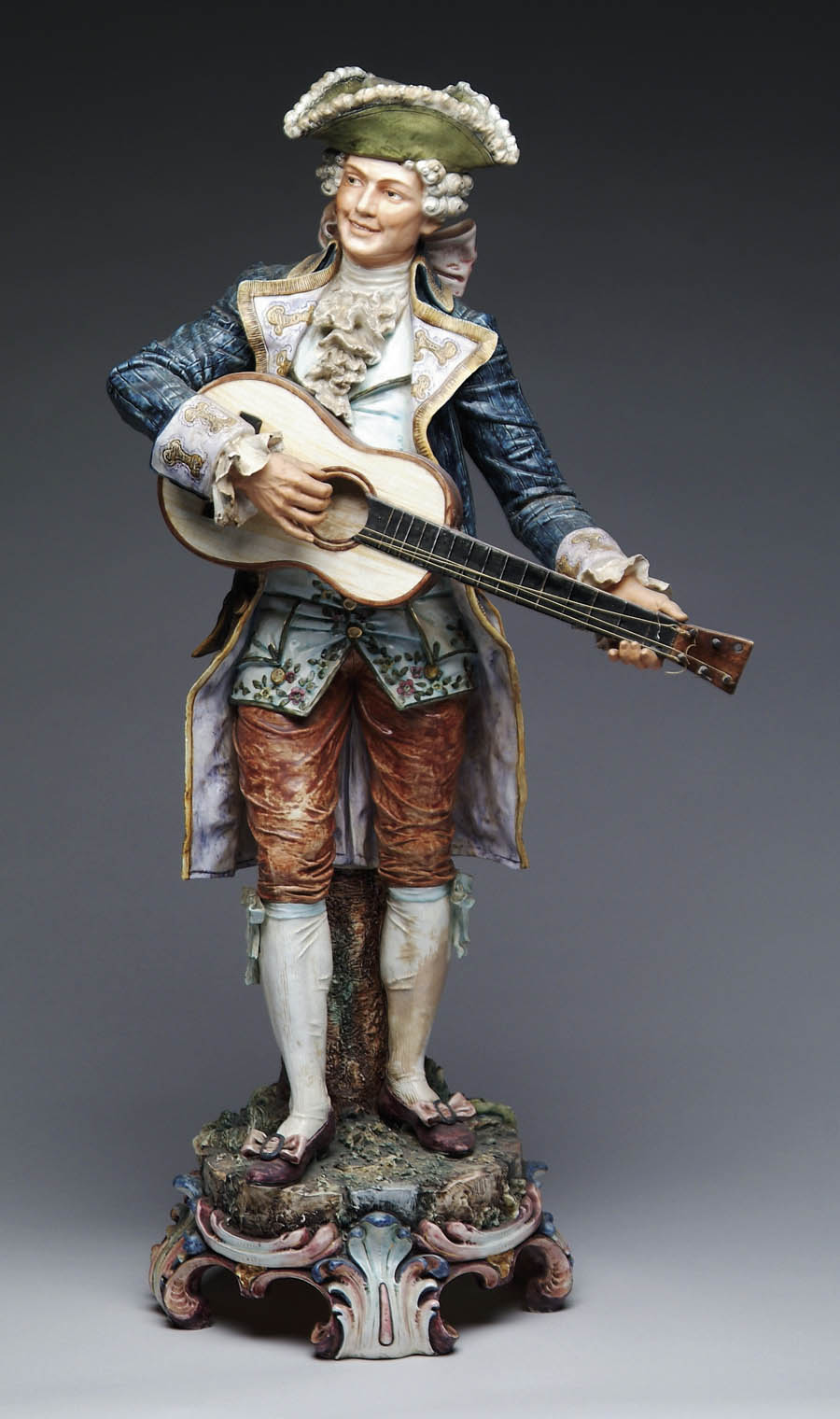 Appraisal: LARGE MAJOLICA FIGURE OF A MAN PLAYING GUITAR h figure