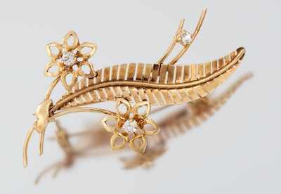 Appraisal: A Ladies' Rose Gold Brooch Tested k rose gold flower