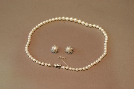 Appraisal: A strand of boxed Majorca graduated pearls and matching marquasite